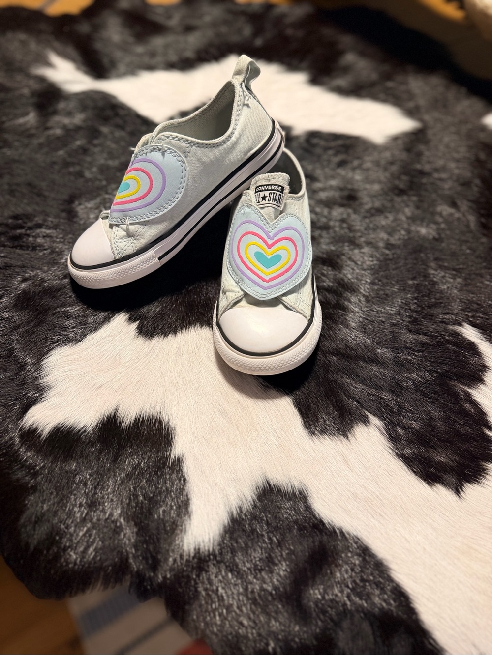 Converse Kids White Slip-On Sneakers with Rainbow Heart Velcro Patch